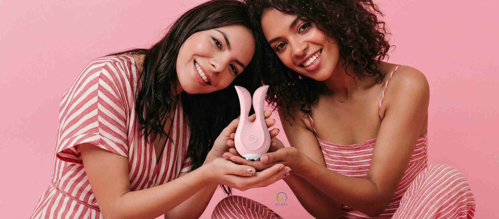 Two women in striped dresses